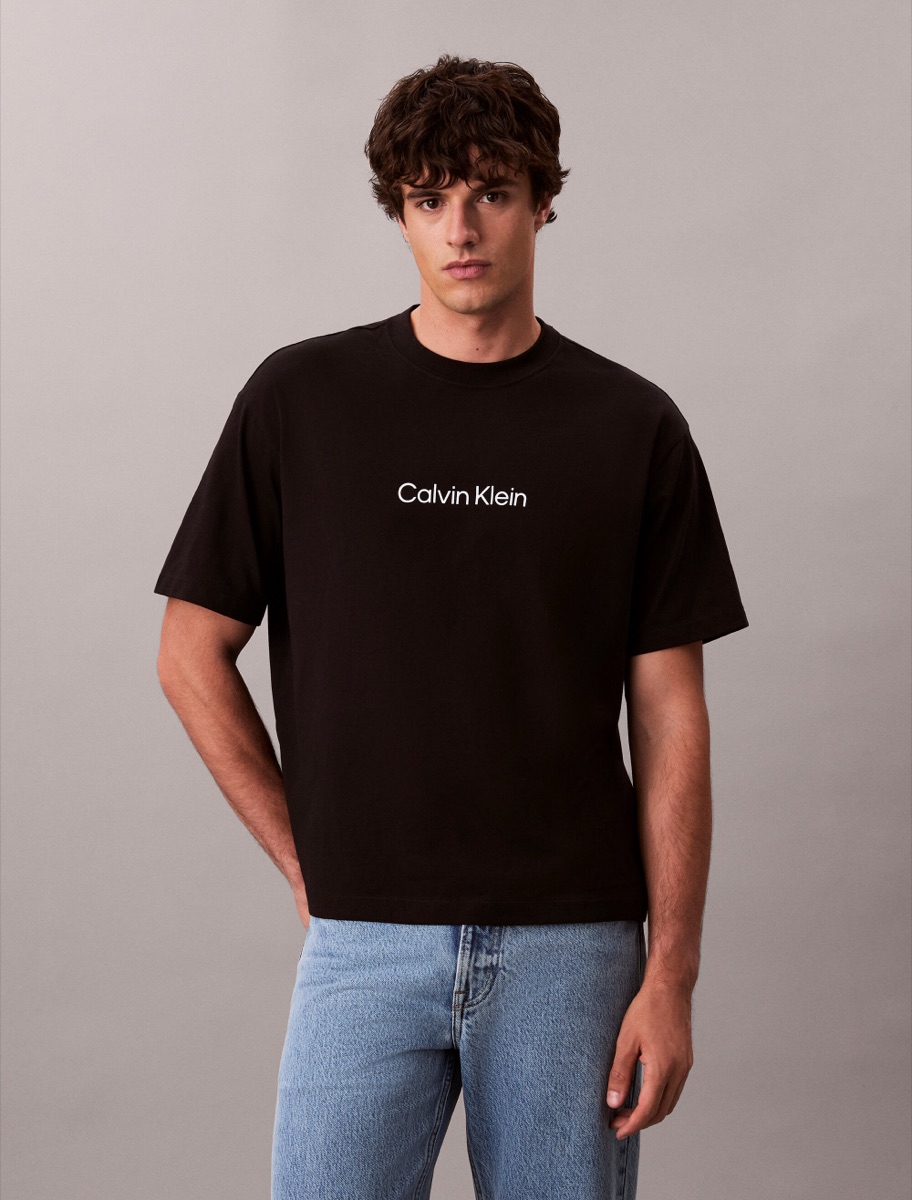 Calvin Klein Heritage Logo Crewneck Tee — Black delivered to your villa in Nusa Dua, Bali